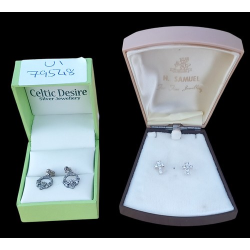 231 - 2 PAIRS OF SILVER EARRINGS- GEM SET CROSS & A PIAR OF CLADDAGH