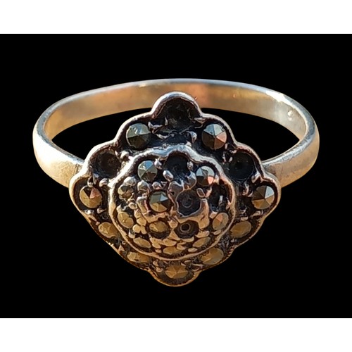 254 - A SILVER MARCASITE RING