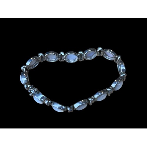 258 - A SILVER AND OPAL TYPE STONE BRACELET