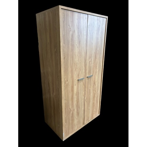 295 - A HEAVY OAK DOUBLE DOOR ROBE