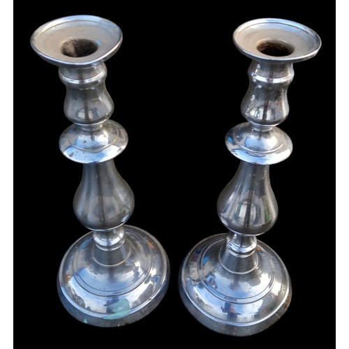 337 - A PAIR OF CHROME CANDLESTICKS