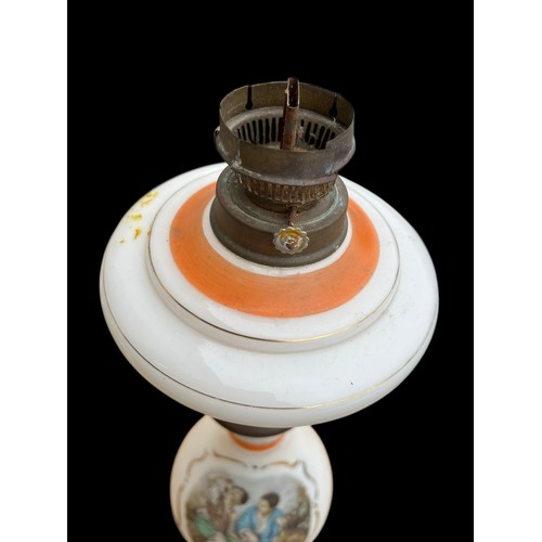 311 - A PAINTED GLASS BASE OIL LAMP