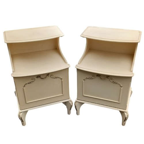 313 - A PAIR OF WHITE BEDSIDE LOCKERS