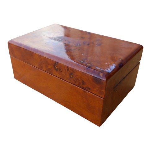 396 - A BIRDS EYE WALNUT ACCURIST GOLD WATCH BOX