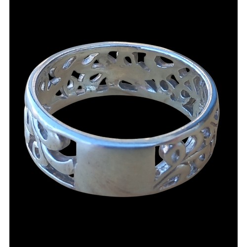 377 - A SILVER OPENWORK RING