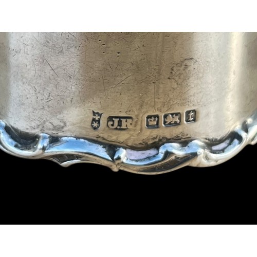 456 - AN ORNATE SILVER NAPKIN RING