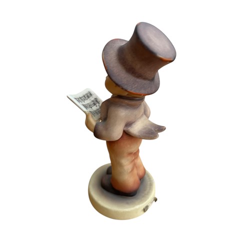 439 - A HUMMELL CERAMIC FIGURE STREET SINGER