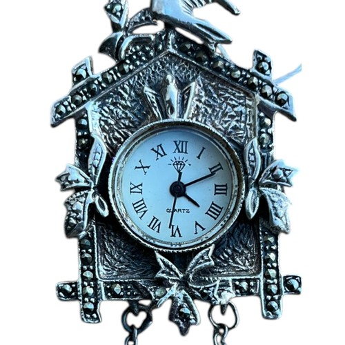 448 - A VERY UNUSUAL STERLING SILVER BROOCH AS A CUCKOO CLOCK