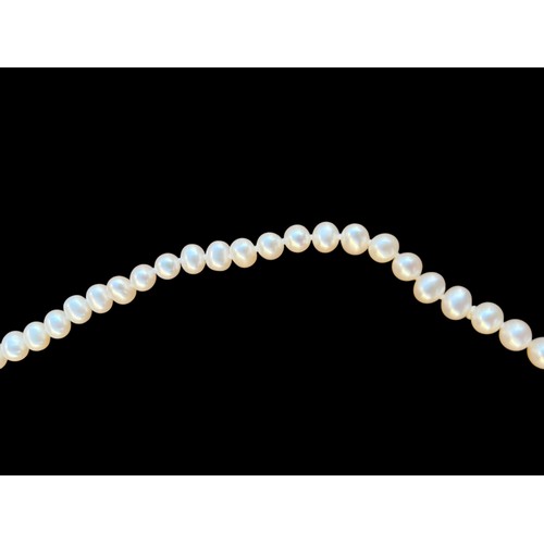 542 - A VERY NICE STRING OF NATURAL PEARLS