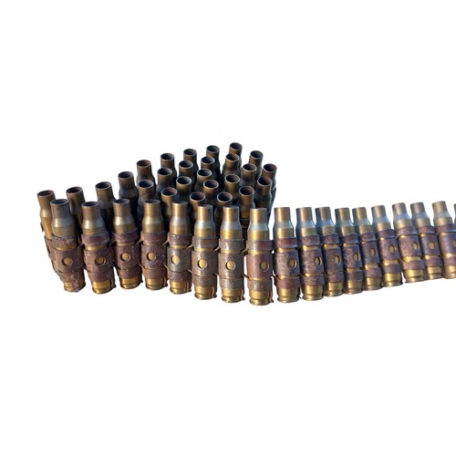 548 - BELT OF SPENT BULLETS WHICH CAME FROM BLAIR MAYNES HOUSE