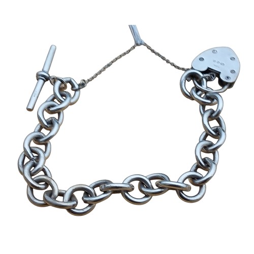 508 - SILVER CURB LINK BRACELET WITH T-BAR AND HEART PADLOCK CATCH 31g