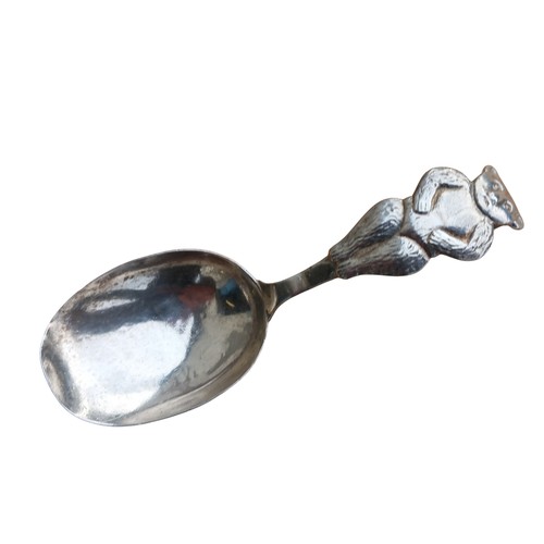 556 - A BABY SILVER (TEDDY) SPOON 36G BIRMINGHAM 1928