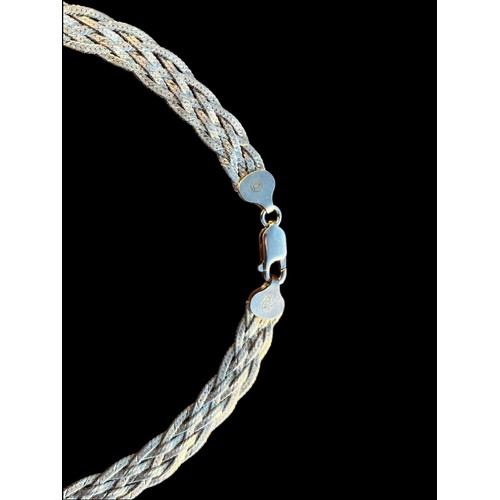 579 - A SILVER MULTI LINK WOVEN NECKLACE