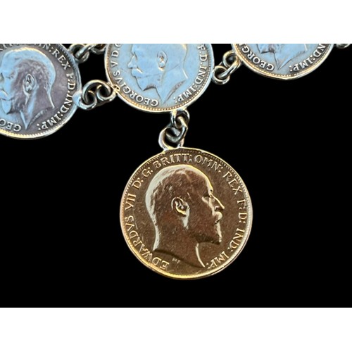 581 - A 1919 SILVER COIN BRACELET SET WITH A HALF 1908 SOVEREIGN COIN