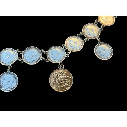 581 - A 1919 SILVER COIN BRACELET SET WITH A HALF 1908 SOVEREIGN COIN