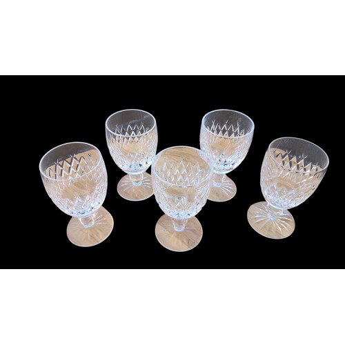 607 - A SET OF 5 WATERFORD CRYSTAL GLASS ON STEM