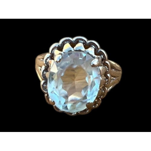 576 - AN ORNATE 10k CITREN SET RING