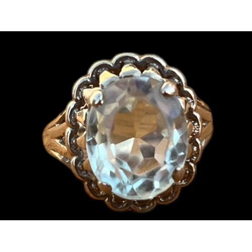 576 - AN ORNATE 10k CITREN SET RING