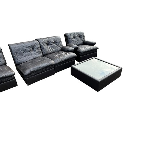 589 - A QUALITY MID CENTURY BLACK LEATHER SUITE CONSISTING OF A LARGE SOFA, ARMCHAIR, COFFEE TABLE & FOOTS... 