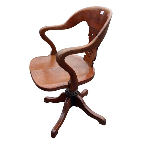 618 - VICTORIAN OAK REVOLVING DESK CHAIR