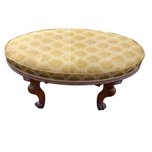 625 - A REGENCY FOOTSTOOL ON  CABRIOLE LEG ON TURNED FOOT WITH A SHAPED OVAL TOP