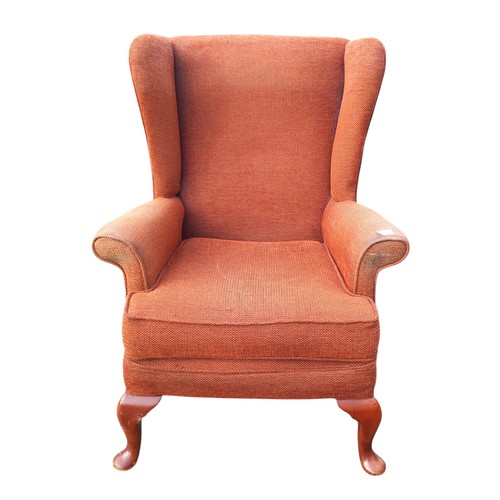 630 - A VINTAGE HEAVY CAB LEG WINGBACK ARMCHAIR