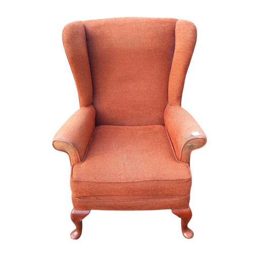 630 - A VINTAGE HEAVY CAB LEG WINGBACK ARMCHAIR