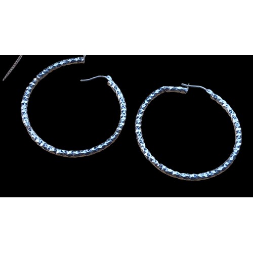 444C - A PAIR OF SILVER EARRINGS 1.5