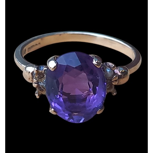 500 - A 9ct GOLD AMETHYST SET RING SIZE K/L 2.4grm