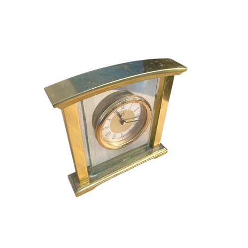 65A - A BRASS AND GLASS MANTLE CLOCK