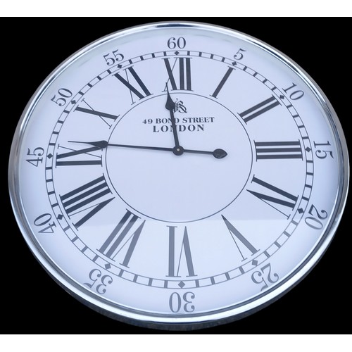 6 - A CHROME FINISH CLOCK 