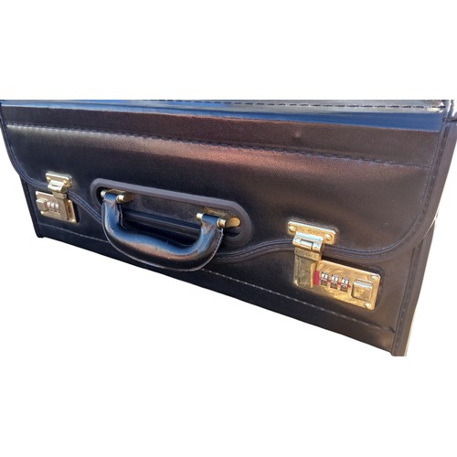 51 - A LEATHER BRIEFCASE