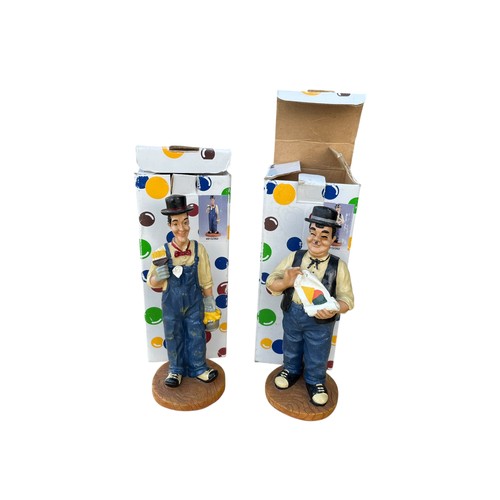 56 - A PAIR OF BOXED LAURELL AND HARDY FIGURES