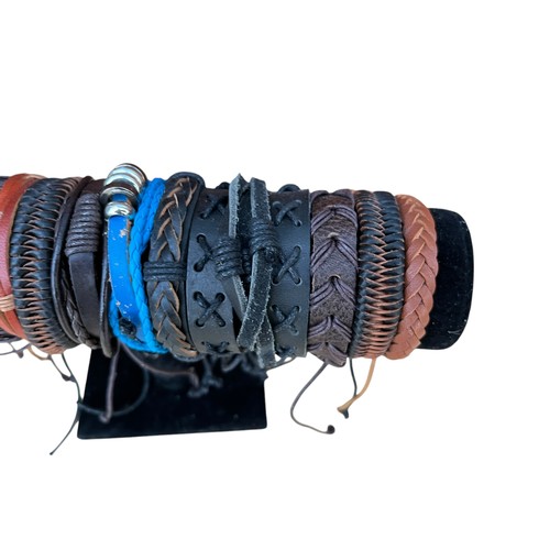 66 - A STAND ON BRAND NEW LEATHER BRACELETS