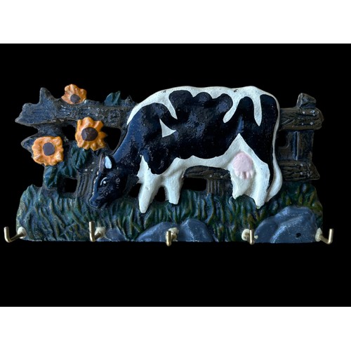 100 - A CAST COW PLAQUE WITH HOOKS