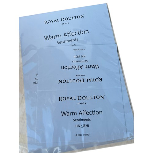 106 - A BOXED ROYAL DOULTON FIGURENE WARM AFFECTION HN5876 AND 16cm TALL