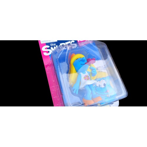 142 - 3 BOXED COLLECTABLE SMURF FIGURES