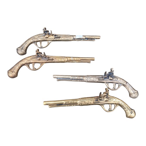 159 - 2 PAIR OF BRASS WALL MOUNTED PISTOLS