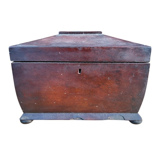 184 - AN ANTIQUE MAHOGANY SHAPED TEA CADDY 10 x 6 x 7