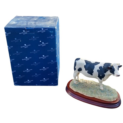 191 - A BOXED BORDER FINE ARTS HOLSTEIN BULL