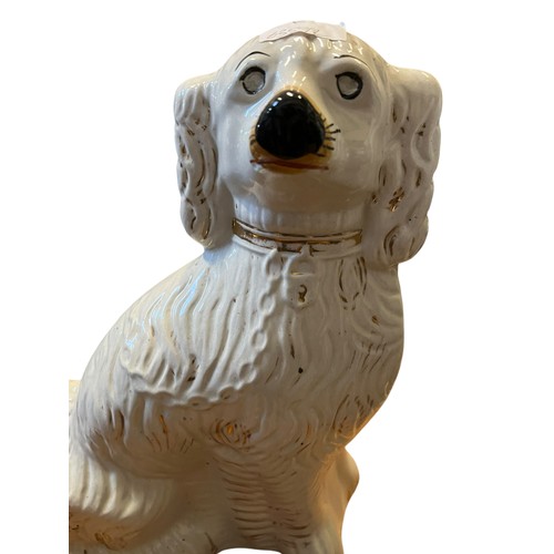 42 - A PAIR OF VICTORIAN STAFFORDSHIRE FIRESIDE SPANIELS