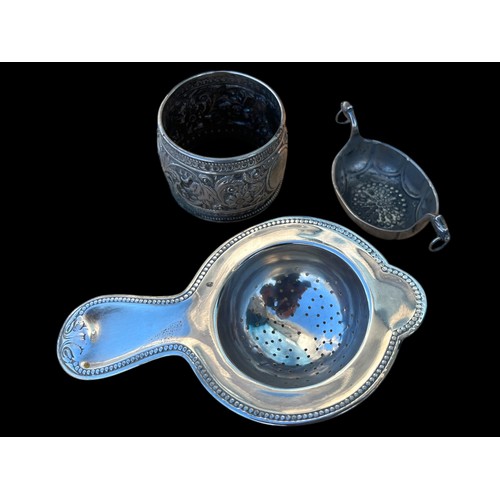 202 - A TEA STRAINER NAPKIN RING AAND DISH