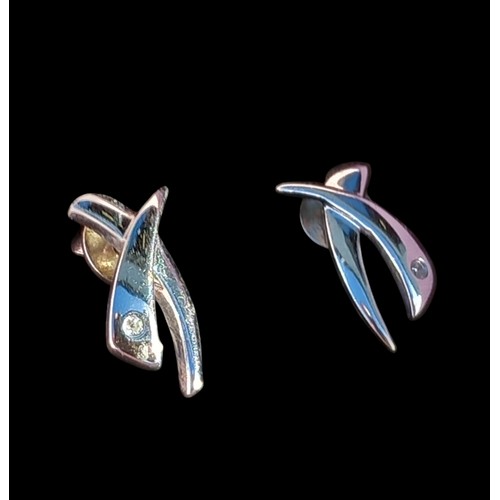 205 - A PAIR OF DESIGNER SILVER DIAMOND SET EARRINGS