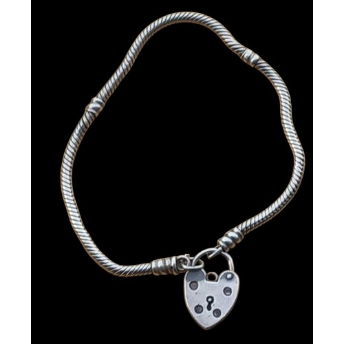 209 - A SILVER INTERLINK BRACELET SET WITH A SILVER PADLOCK