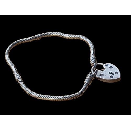 209 - A SILVER INTERLINK BRACELET SET WITH A SILVER PADLOCK