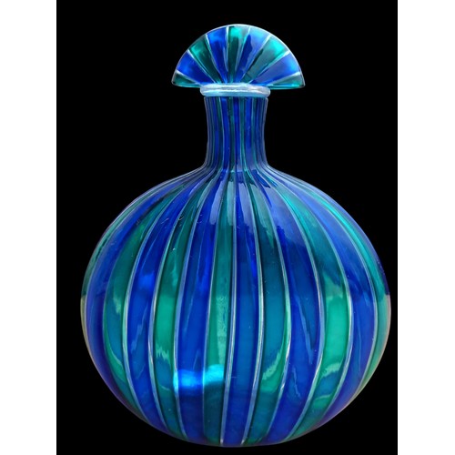 224 - A DESIGNER DECANTER IN VIBRANT COLOUR GLASS