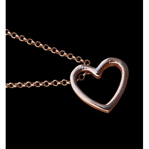 230 - A GOLD PLATED HEART PENDANT AND MATCHING CHAIN