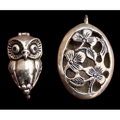 240 - 2 WHITE METAL PENDANTS