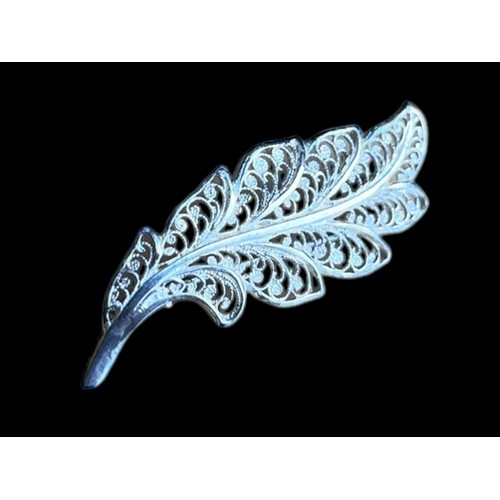 243 - A SILVER LEAF BROOCH