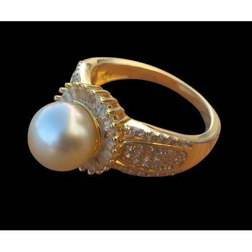 271 - A SILVER GILT GEM SET SILVER RING WITH A PEARL